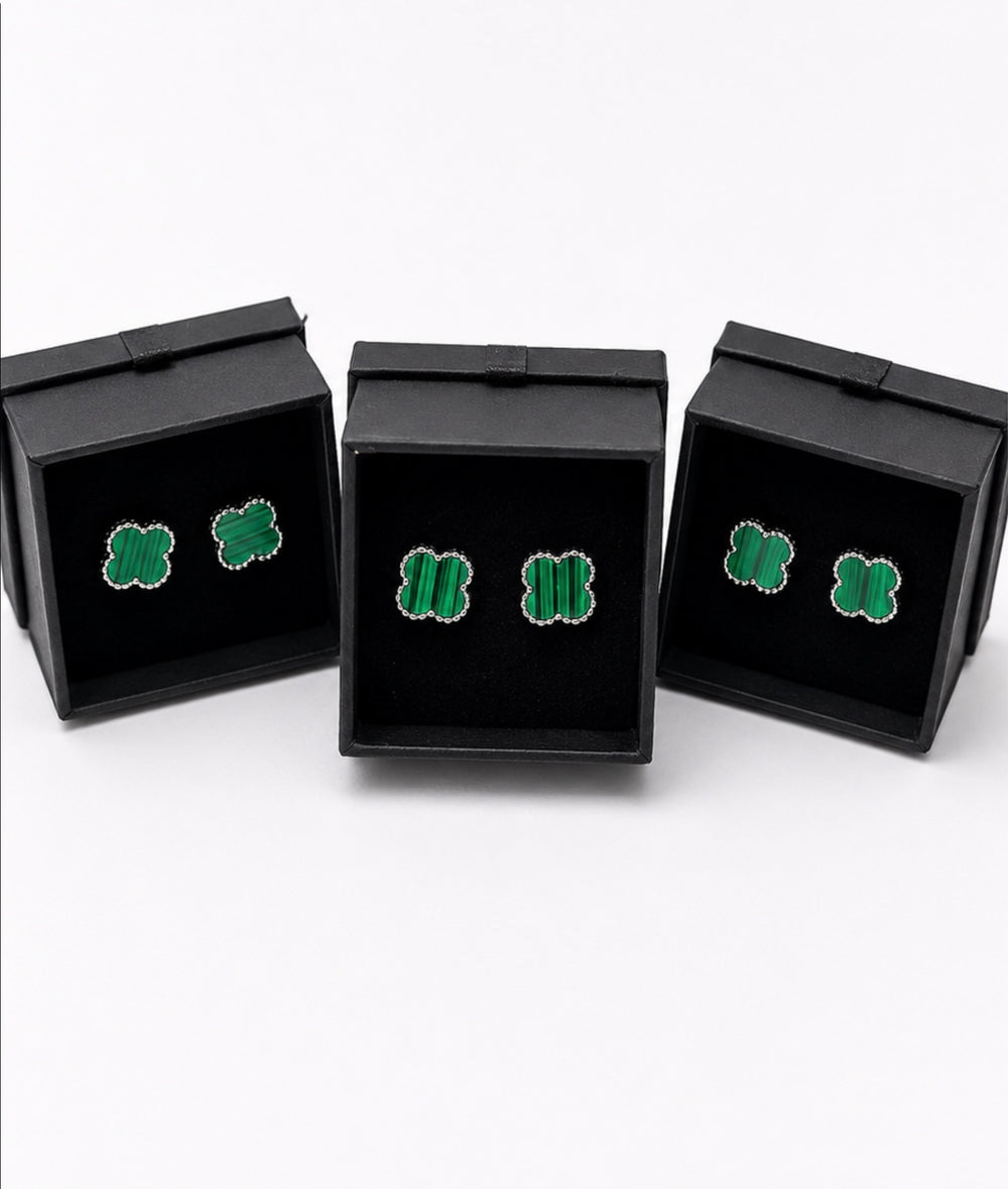 Green clover shaped stud earrings with striped stone effect centre and silver tone beaded edging