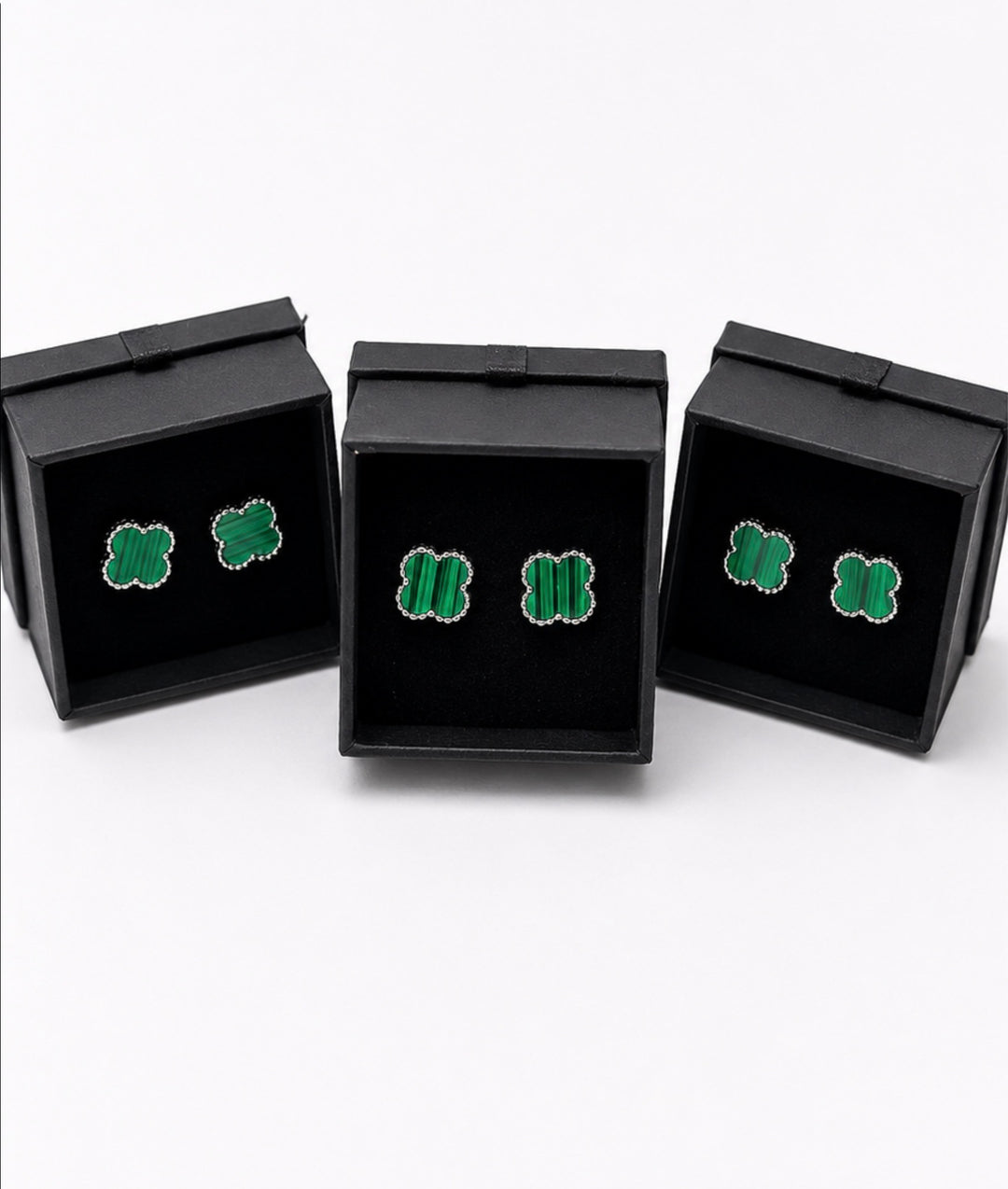 Green clover shaped stud earrings with striped stone effect centre and silver tone beaded edging
