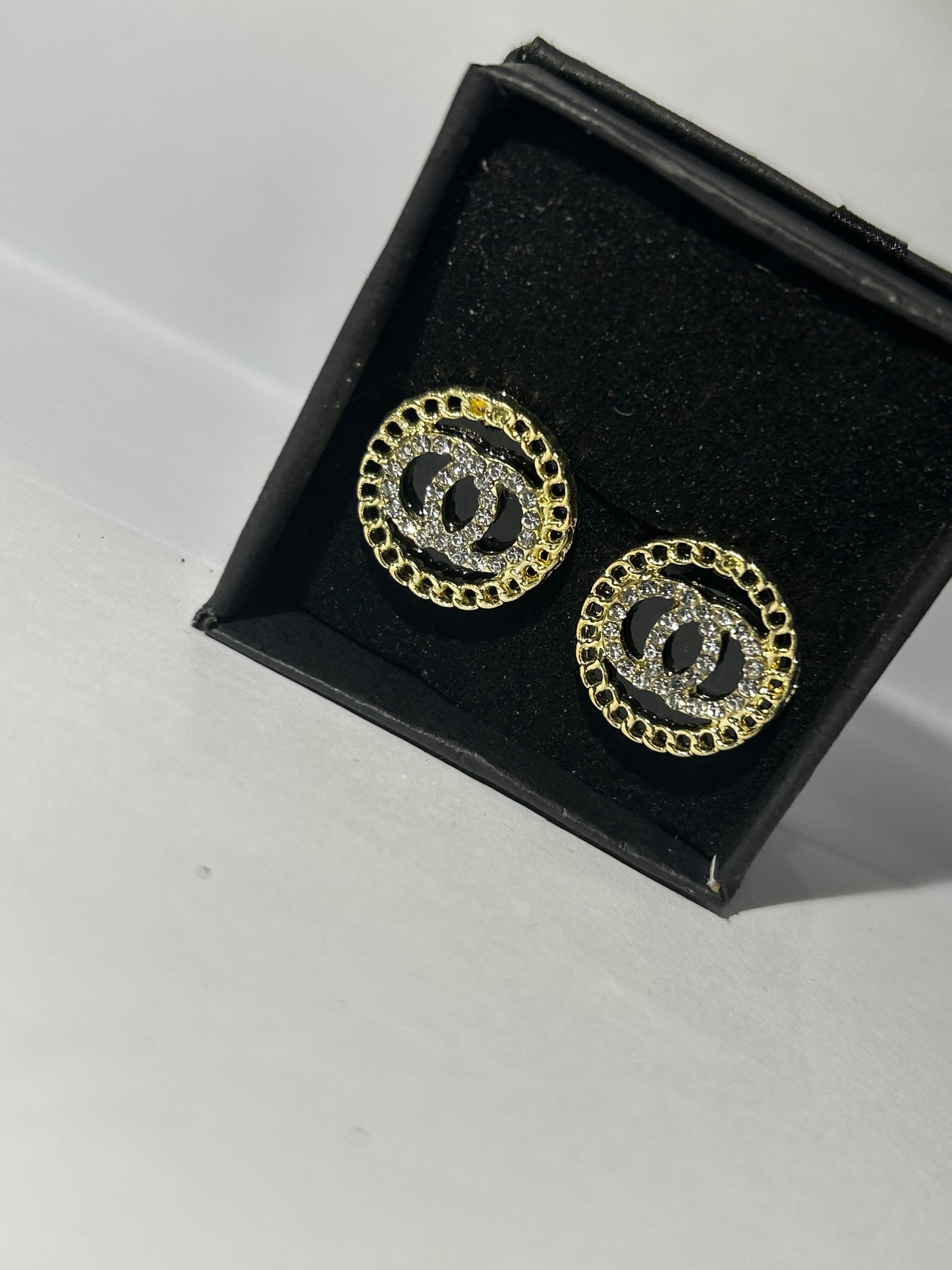 Black and gold circle earrings