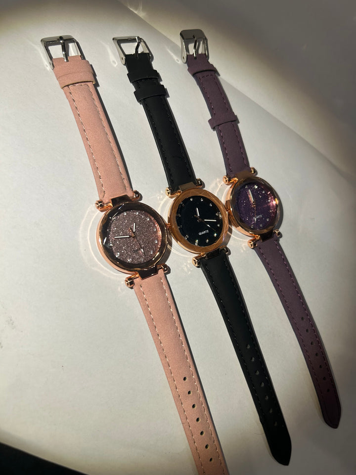 Glitter-faced watches with rose gold hardware and adjustable straps 
