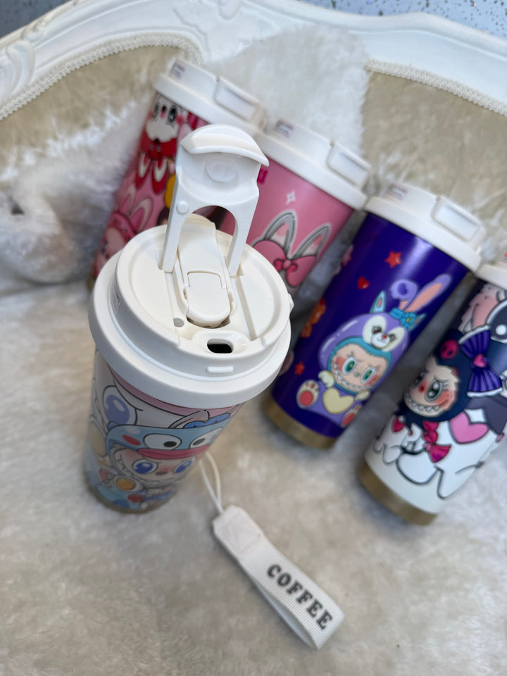 Colorful cartoon-themed tumbler with a straw 