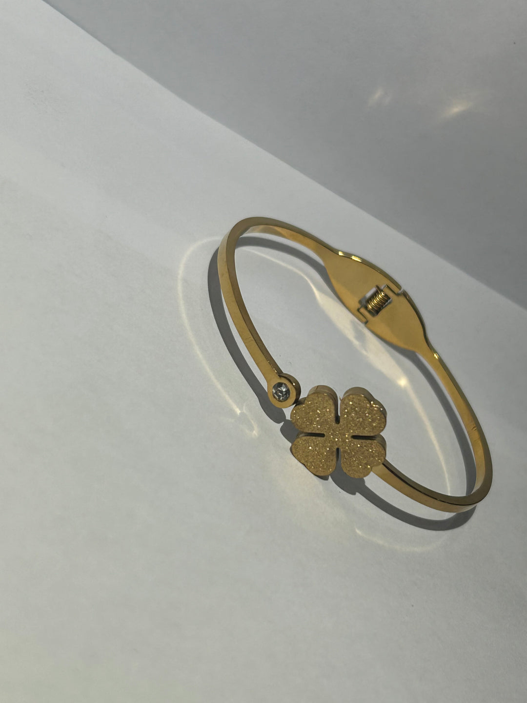 Gold clover bangle bracelet