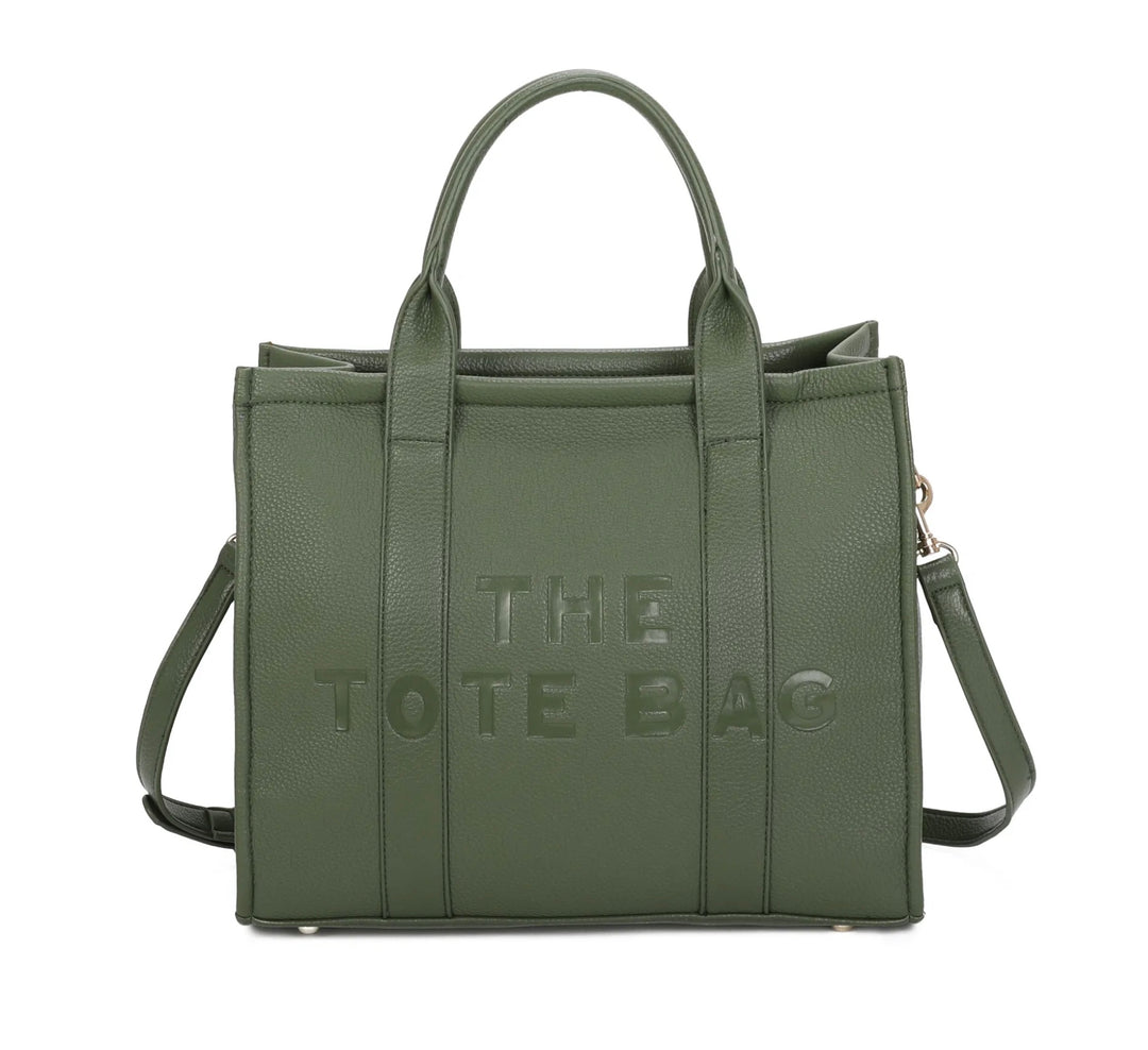 A green tote bag with embossed ‘The Tote Bag’ text, structured design with top handles and detachable shoulder strap