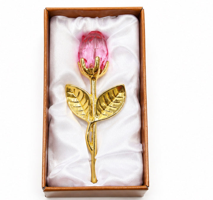 Pink crystal rose keepsake with gold-tone stem and leaves presented in satin-lined gift box
