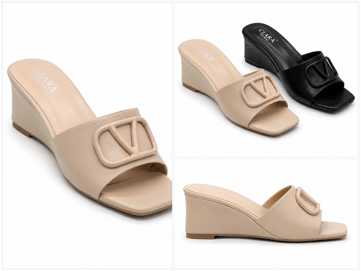 Black and nude wedge mule heels with oversized buckle detail