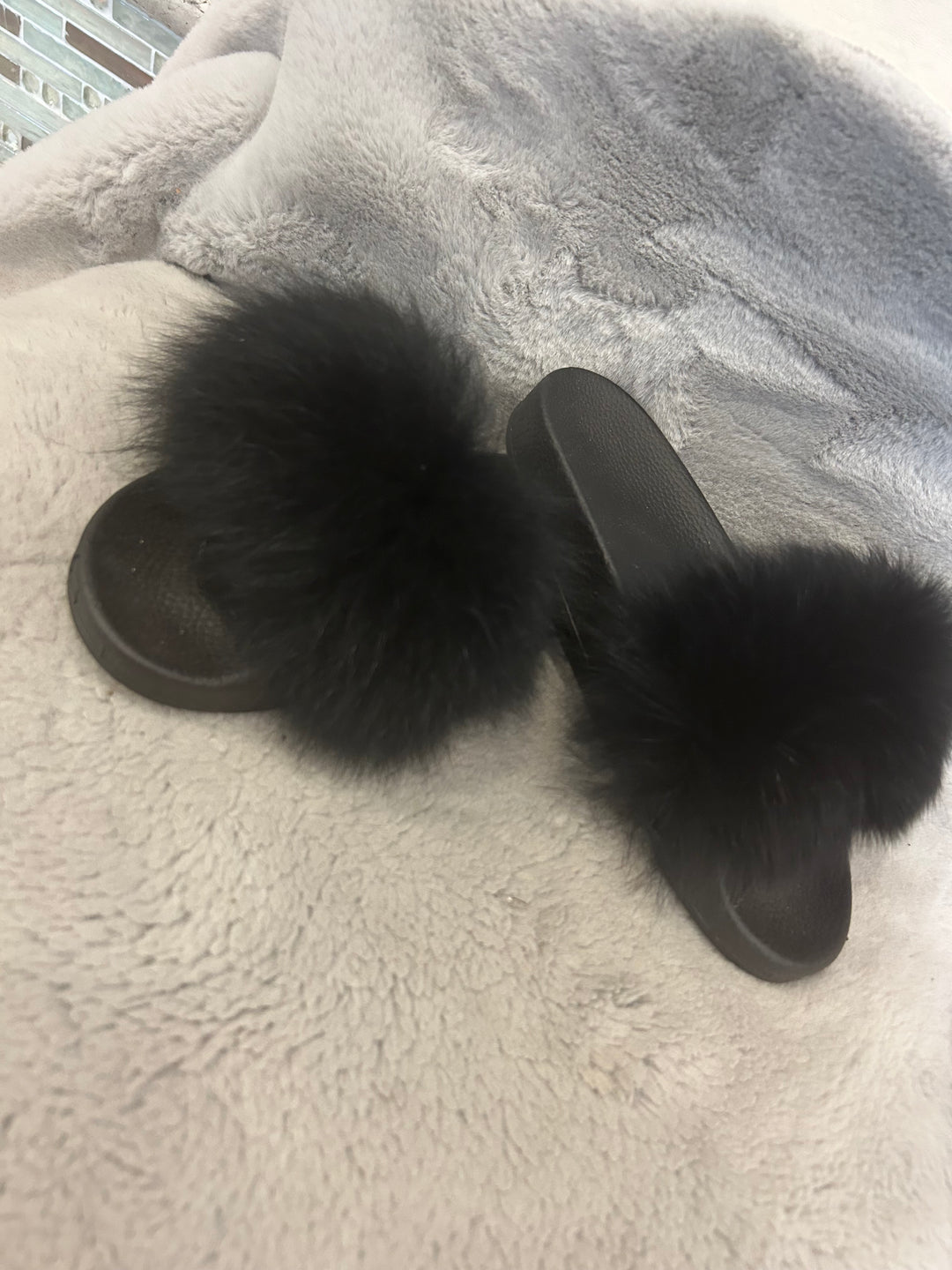 Black fur sliders with black sole 