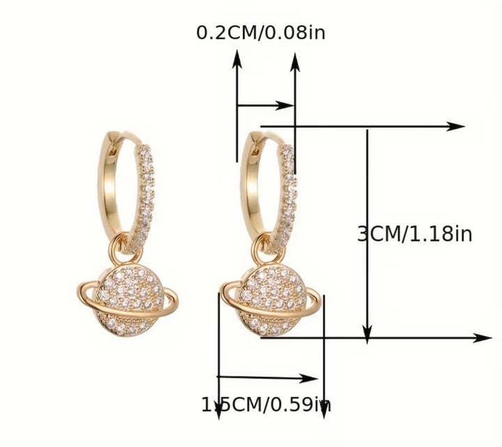 Sparkling crystal planet drop hoop earrings available in gold and silver.