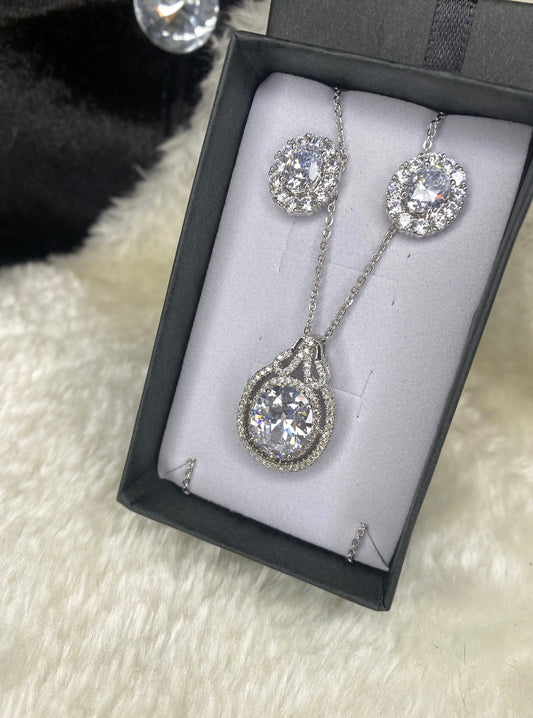 Outlined tear drop silver necklace and earring set