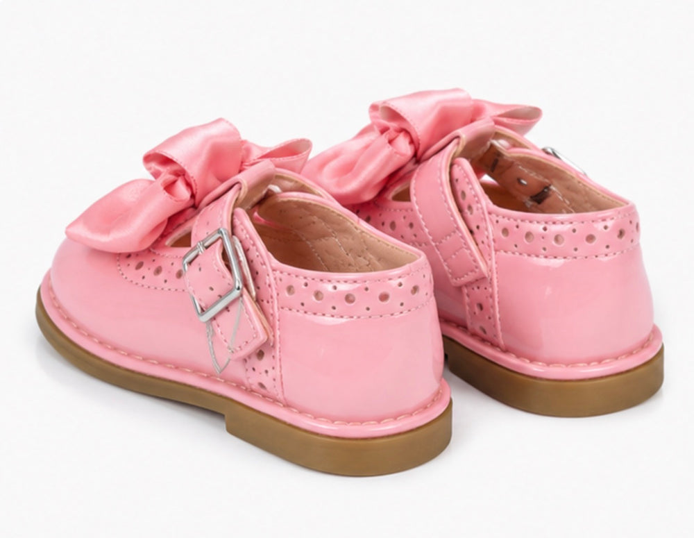 Pink baby girls formal shoes with elegant satin bow accents 