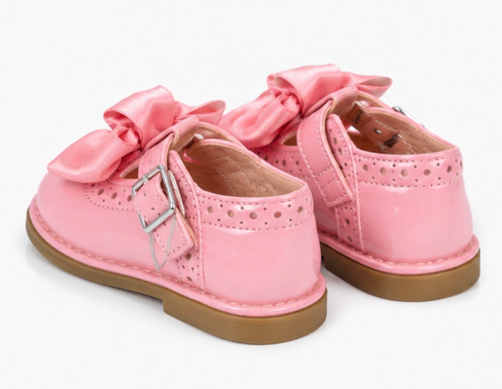 Pink baby girls formal shoes with elegant satin bow accents 