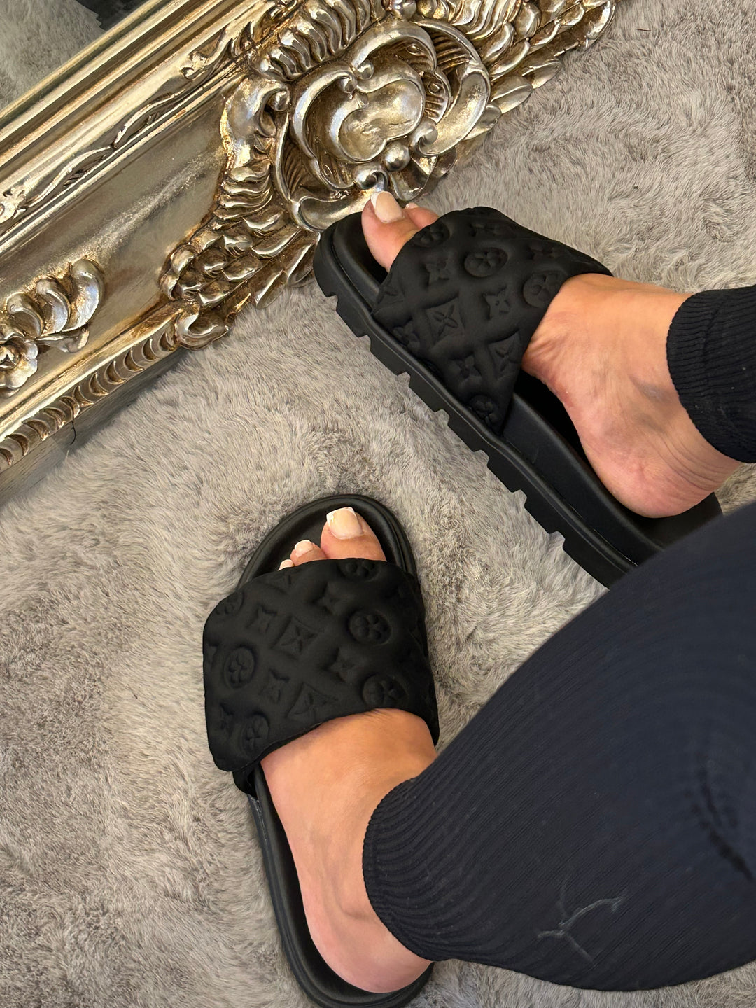 Black textured quilted slider sandals 