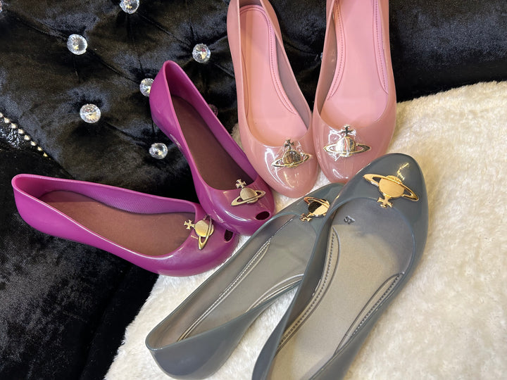 Pink, purple and grey ballet shoes with gold detailing