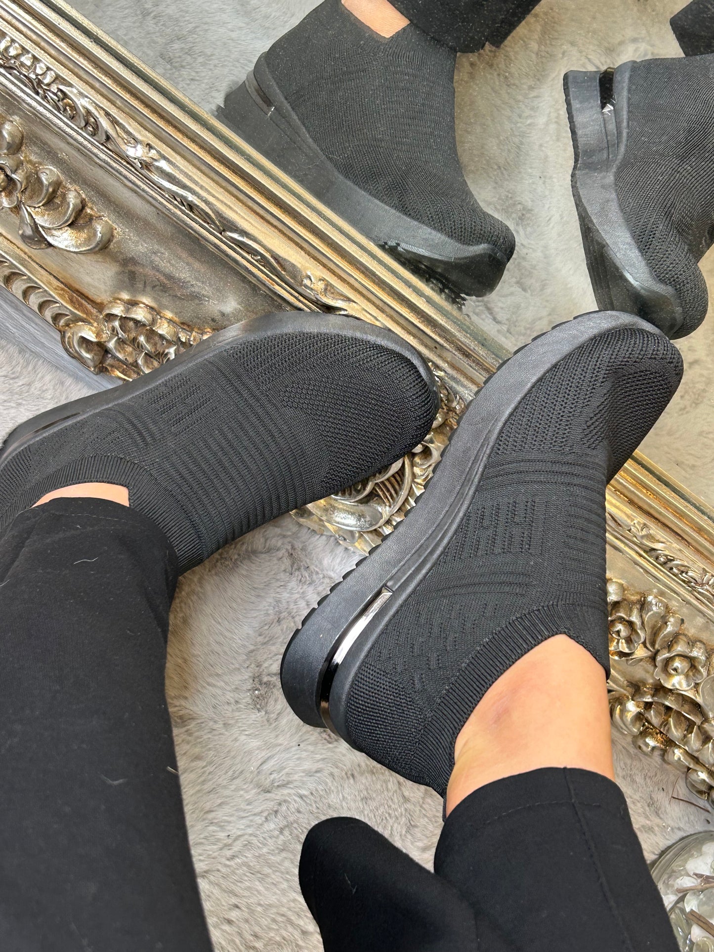 Black slip on sock trainers