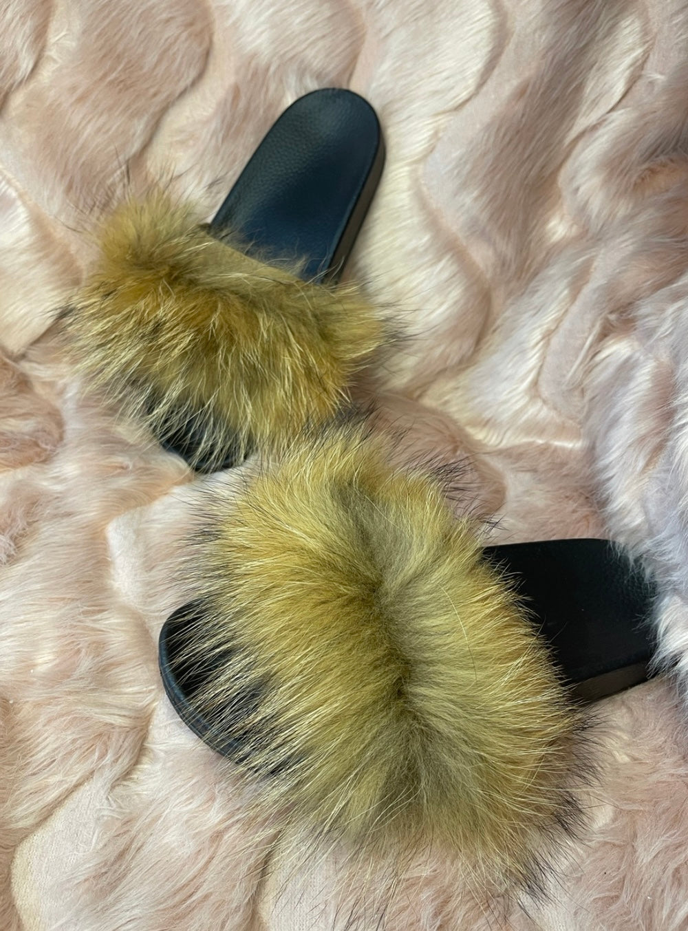 Brown fur sliders with black sole 