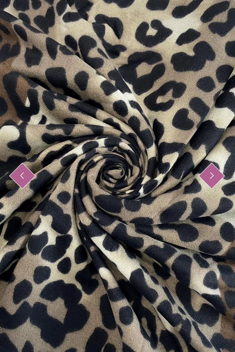 swirl view of A leopard print scarf with frayed edges