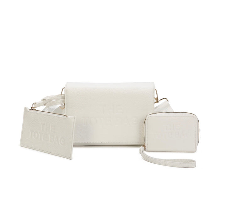 White handbag with matching wallet