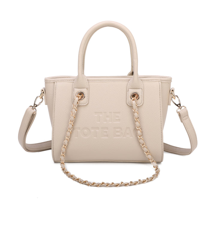 A beige tote bag with a chain handle, featuring a front zipper pocket and gold tone metal hardware. The &