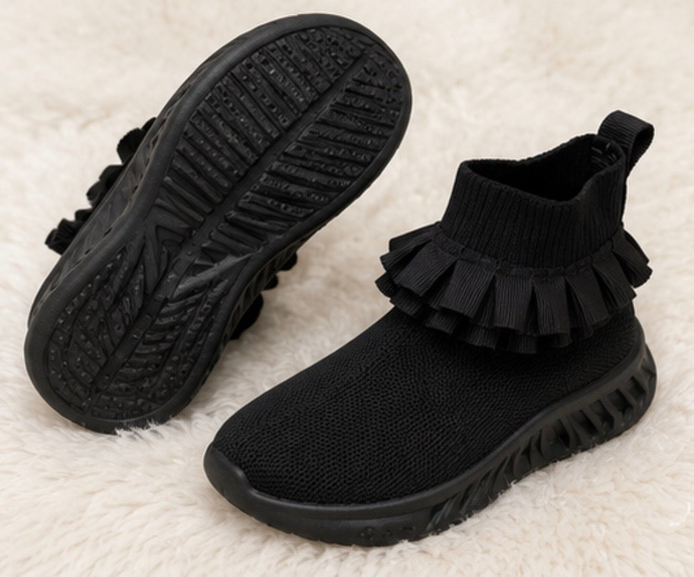 Black kids’ sock-style trainers with layered ruffle ankle detail and chunky black sole