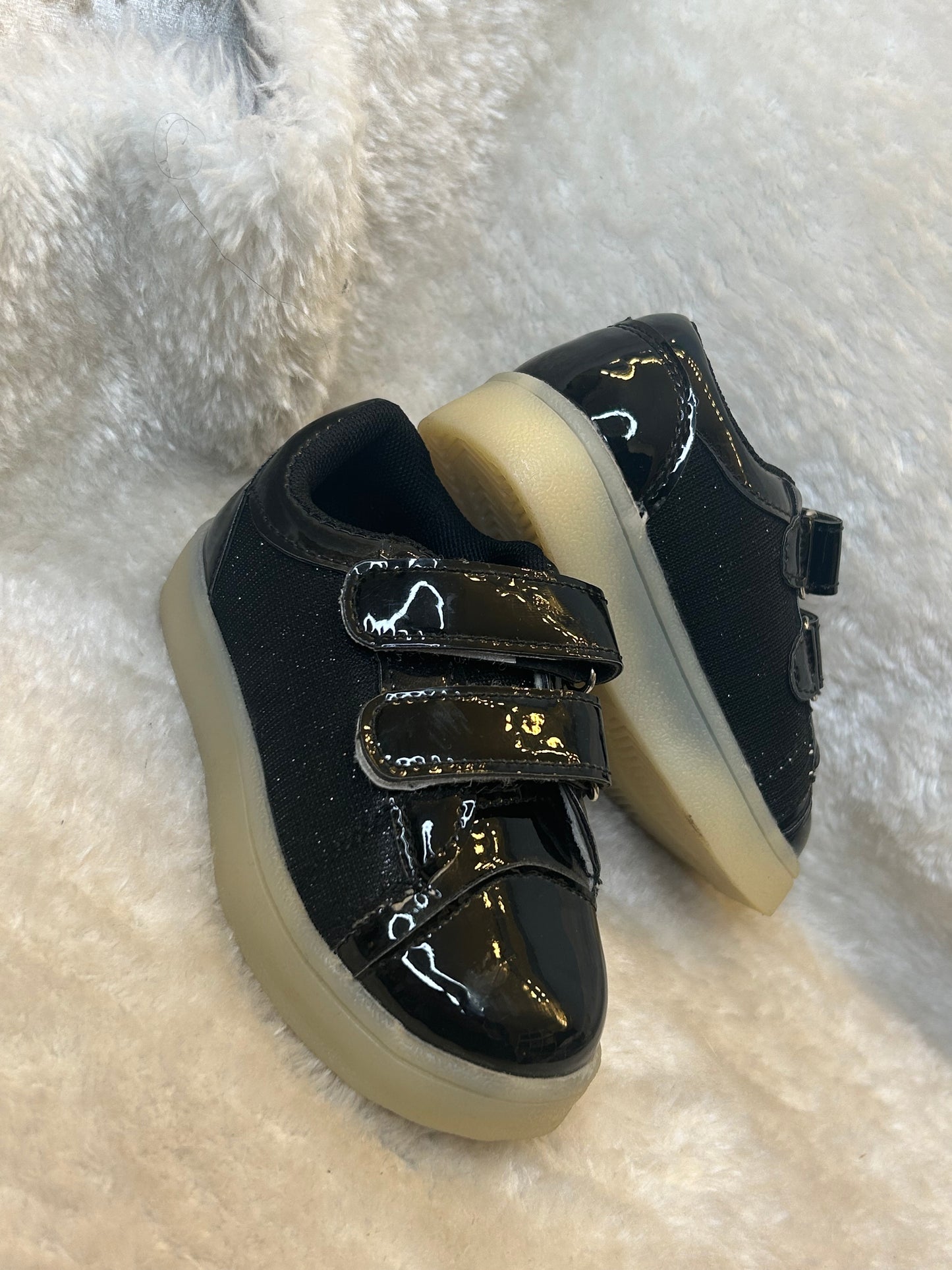 Children’s black patent and fabric trainers with double velcro straps and chunky light sole