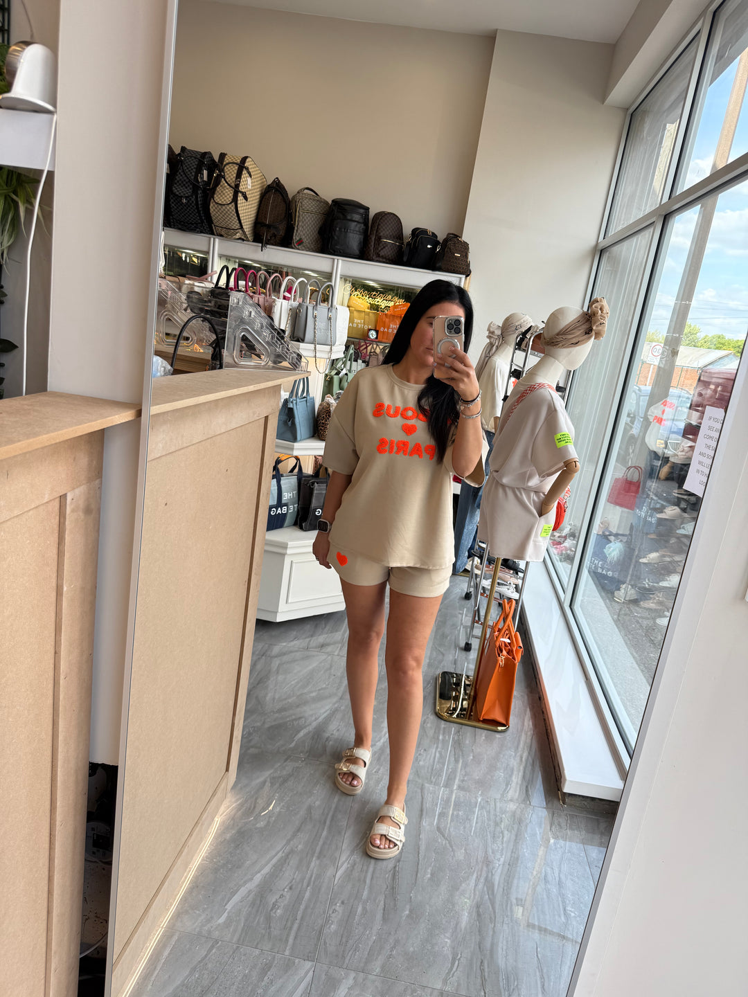 Shorts and T-shirt set in beige with orange writing text 