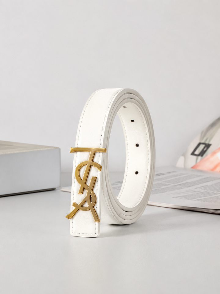 White slim faux leather belt with gold-tone statement buckle.
