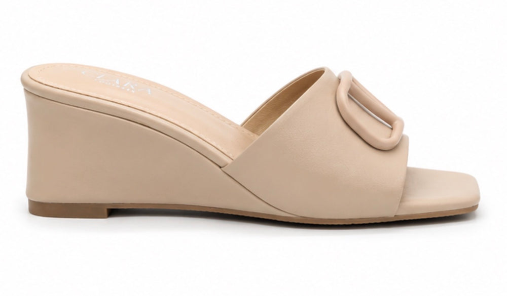 nude wedge mule heels with oversized buckle detail