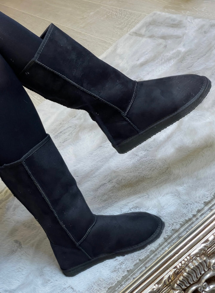 Black faux fur lined winter boots tall and mid calf
