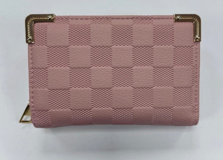 A pink quilted checked purse with gold-coloured edges and a zipper closure.