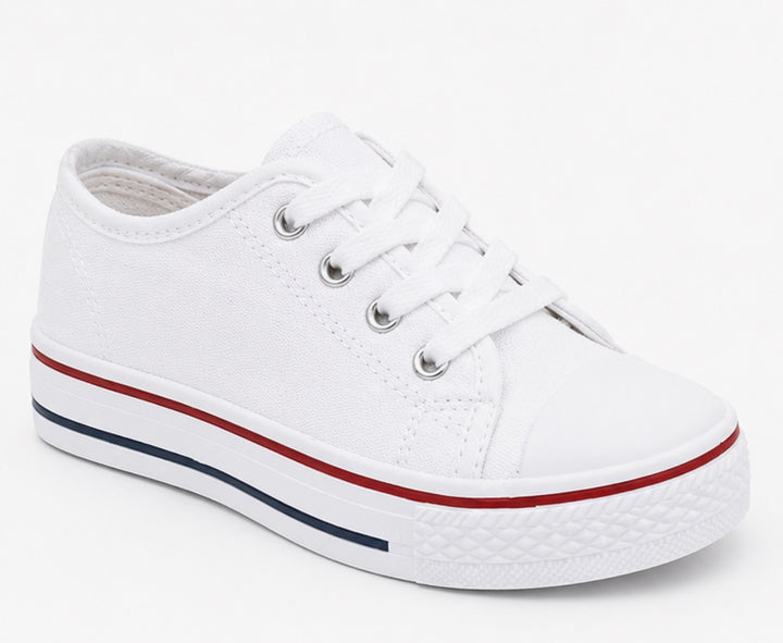 White kids canvas trainers with lace-up fastening and classic chunky sole design.