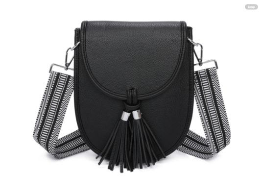 Black handbag with tassels and a striped strap