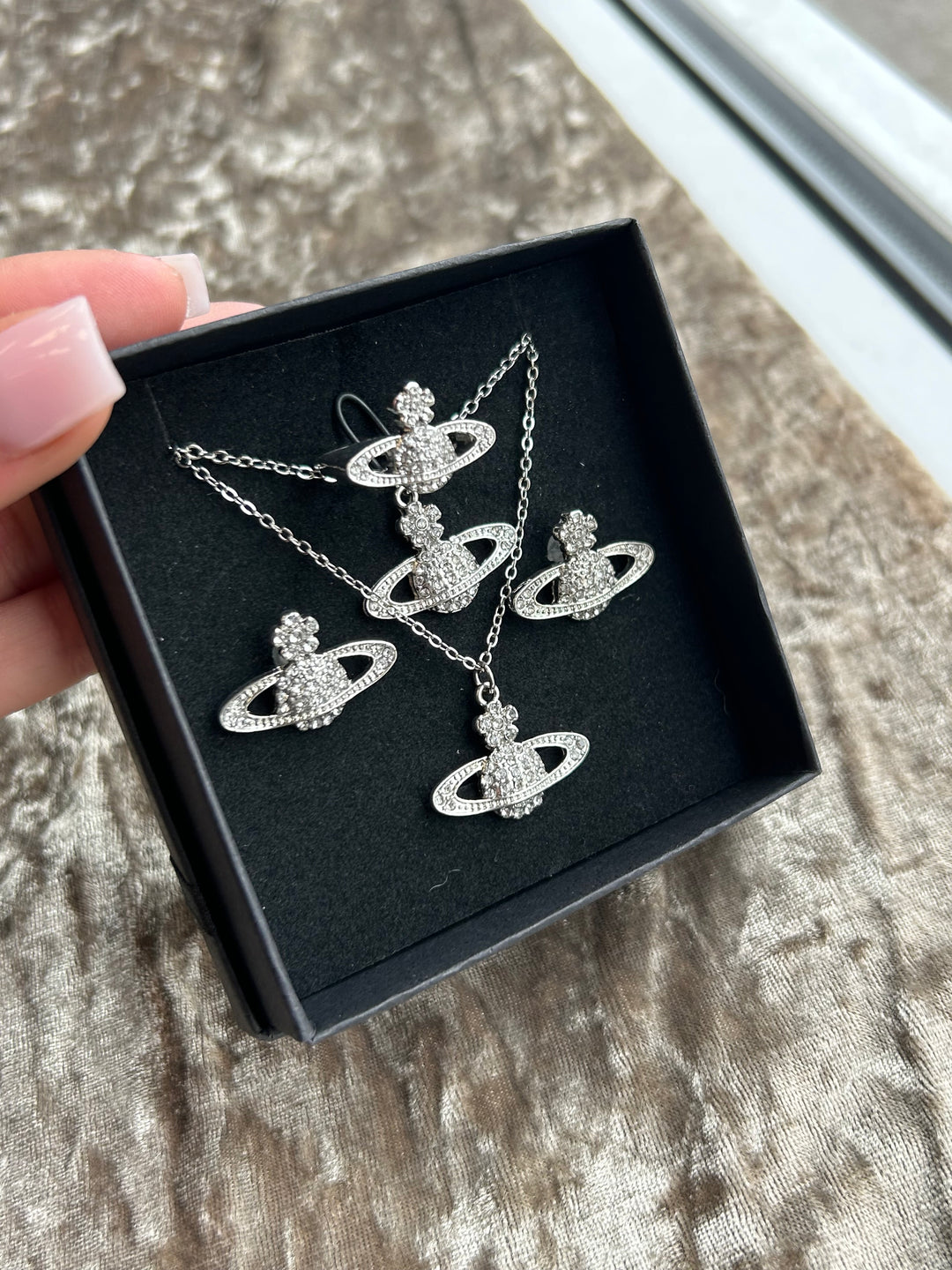 Silvery crystal detail planet orb style jewellery set 