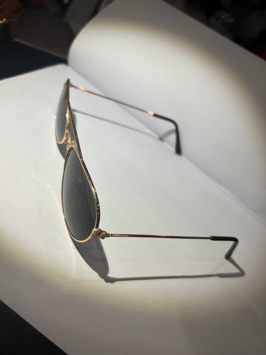 Small black framed gold detail sunglasses 