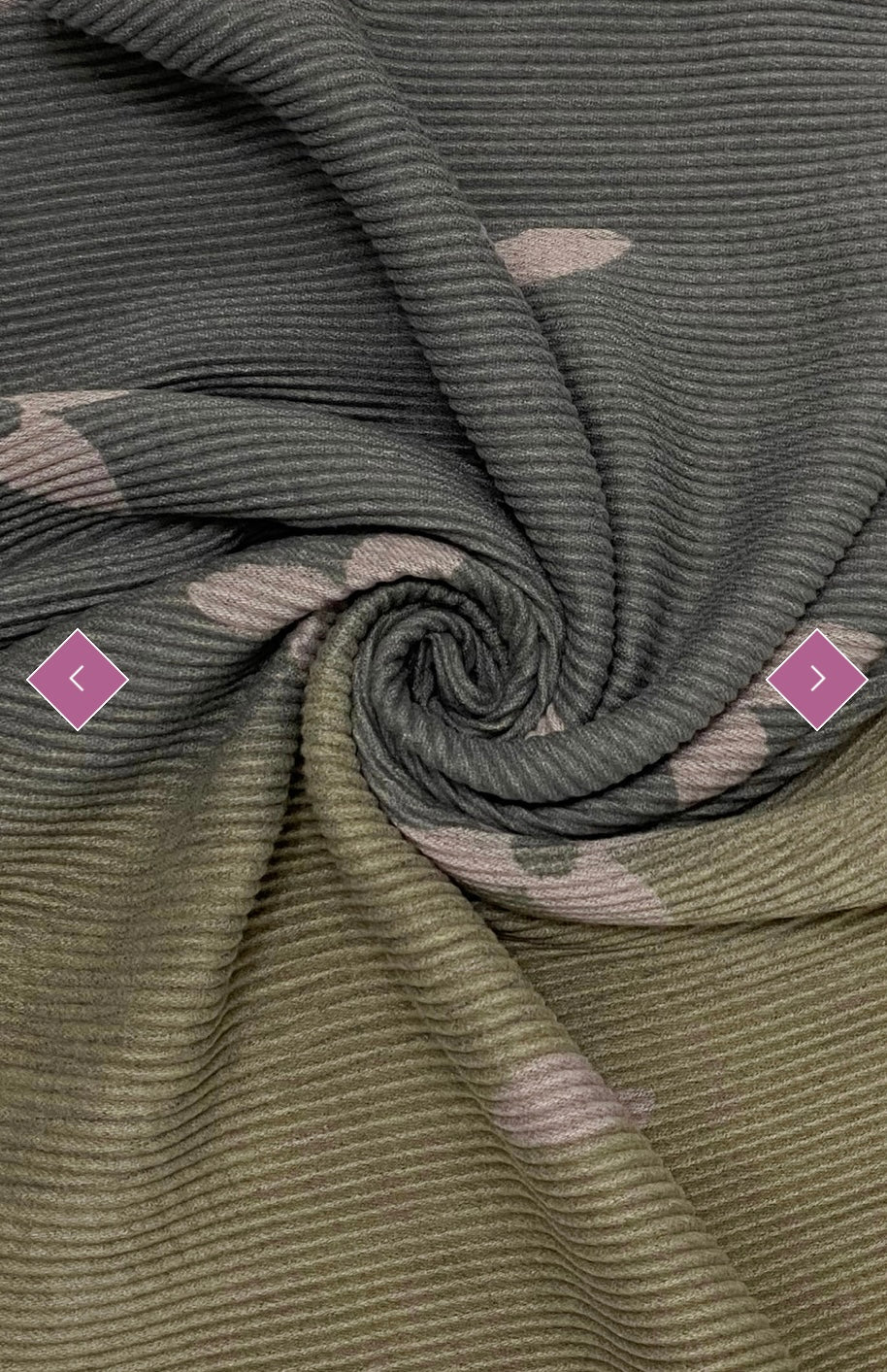 A wool scarf with pleated texture and ombre design, featuring shades of grey and pink flower prints, 