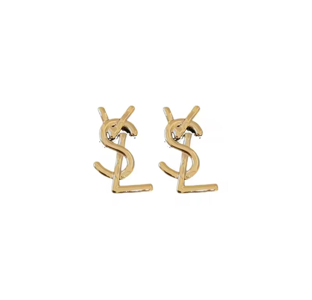 Pair of gold letter-shaped stud earrings with interlocking design 