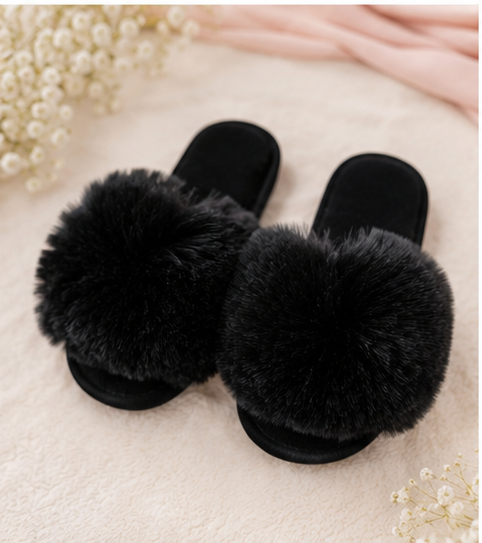 Faux fur slip on children’s slippers in black 
