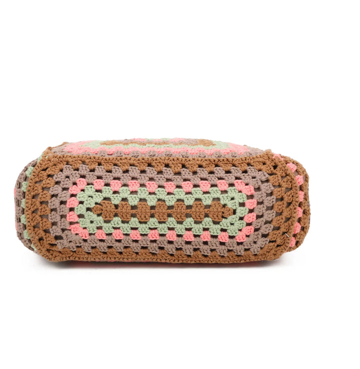 crochet grab bags with bamboo handles and a top zip closure