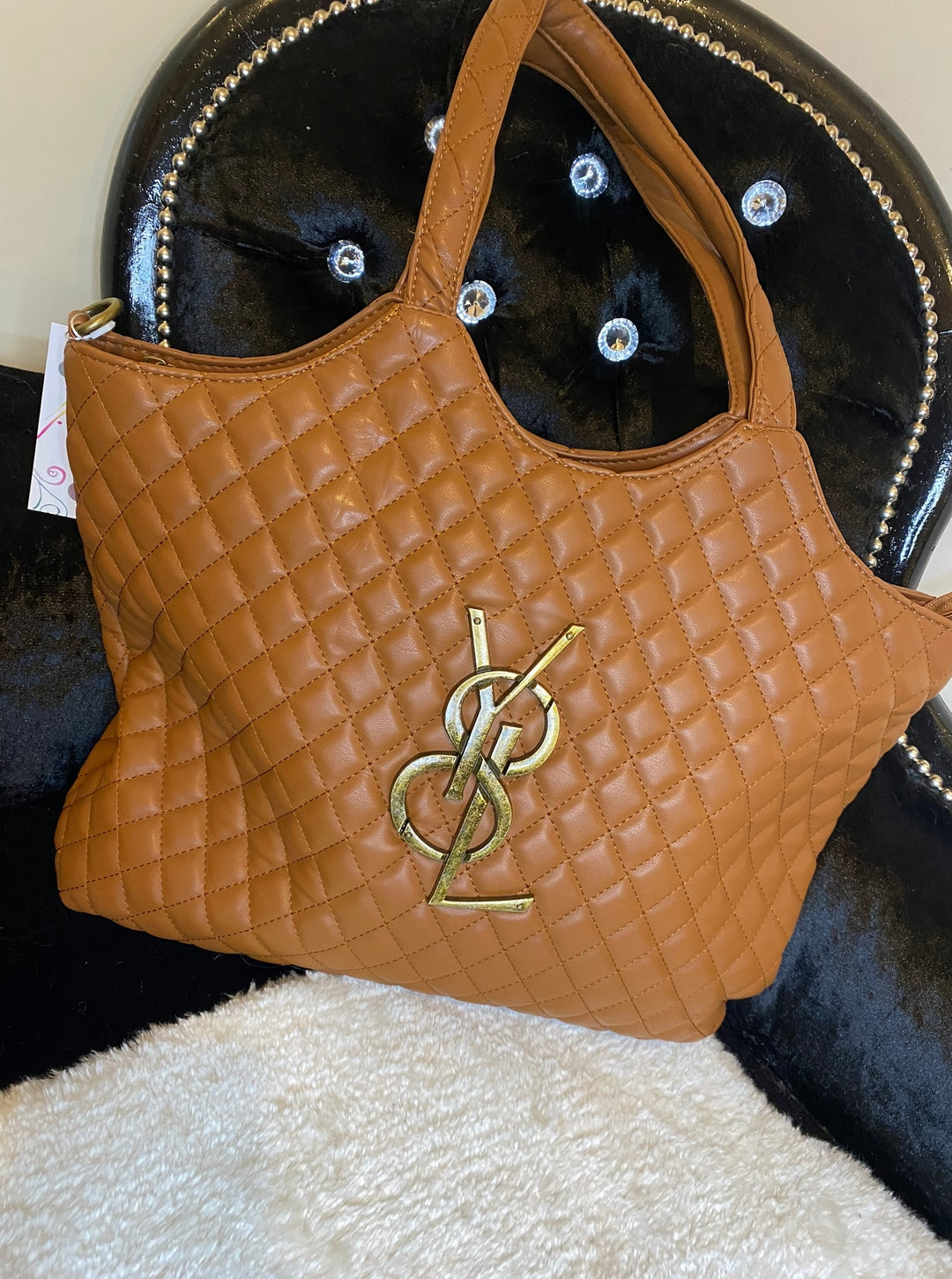 Tan large size quilted bag with gold detailed hardware and long adjustable removable strap