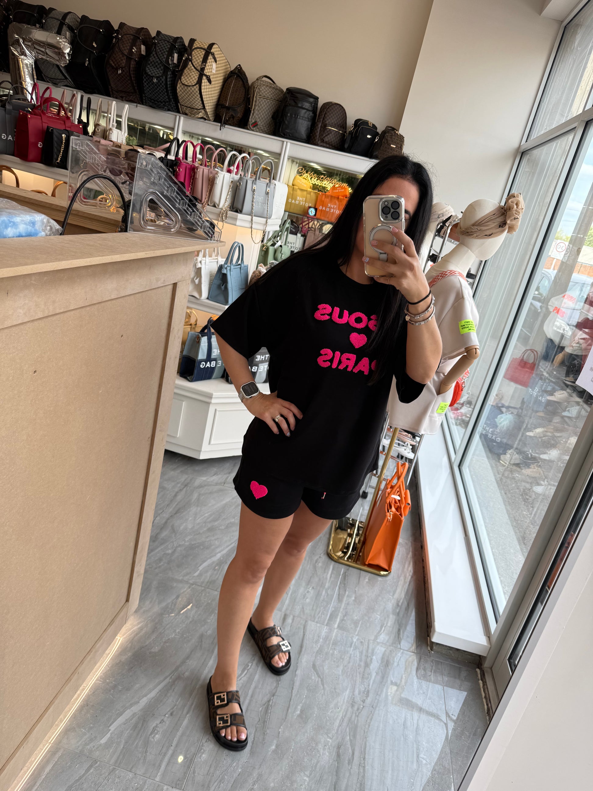 Shorts and T-shirt set in black with pink writing text 