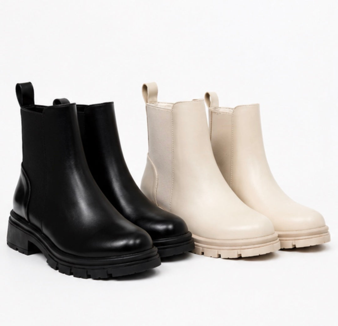 Women’s chunky ankle boots in black and cream with elastic stretch panels