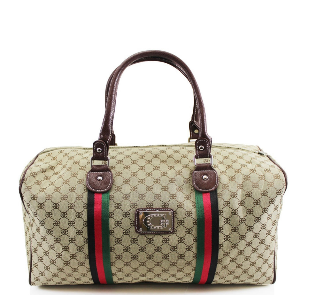 A beige holdall luggage bag with a stripe pattern, featuring red and green accents and a brand plaque.