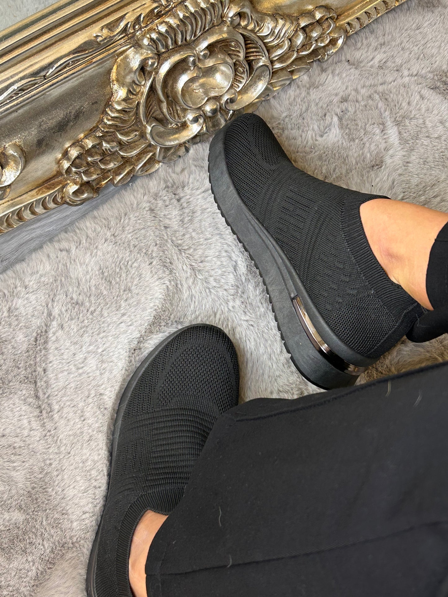 Black slip on sock trainers