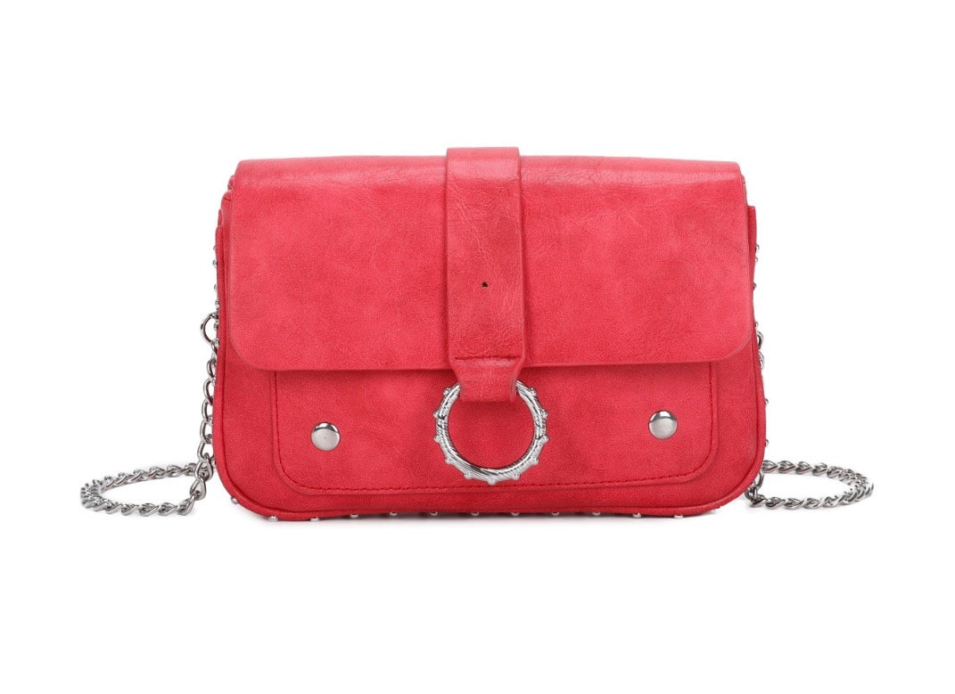 faux leather crossbody bag with silver chain strap and statement ring detail fastening.