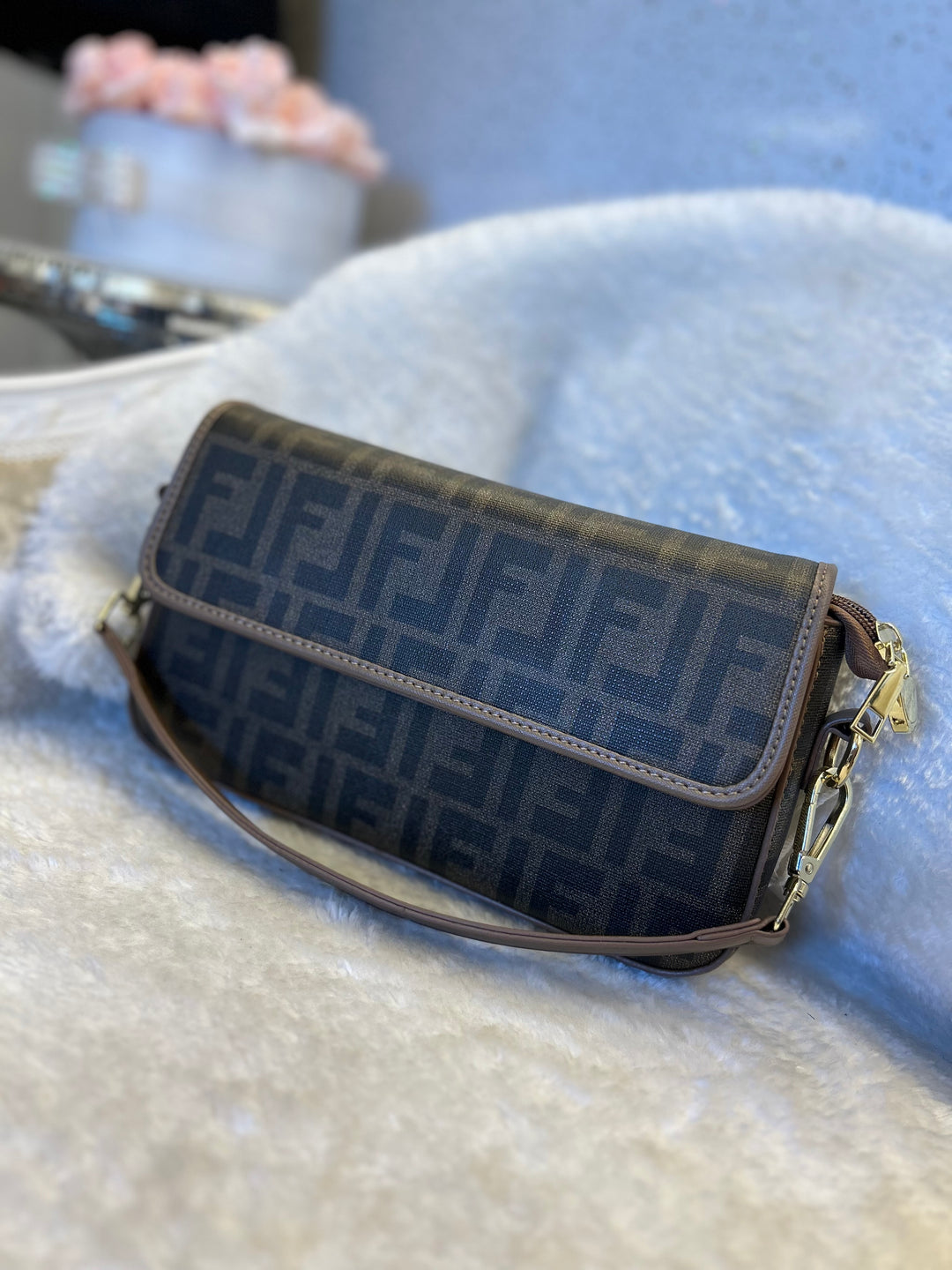 Brown geometric print handbag with shoulder strap 