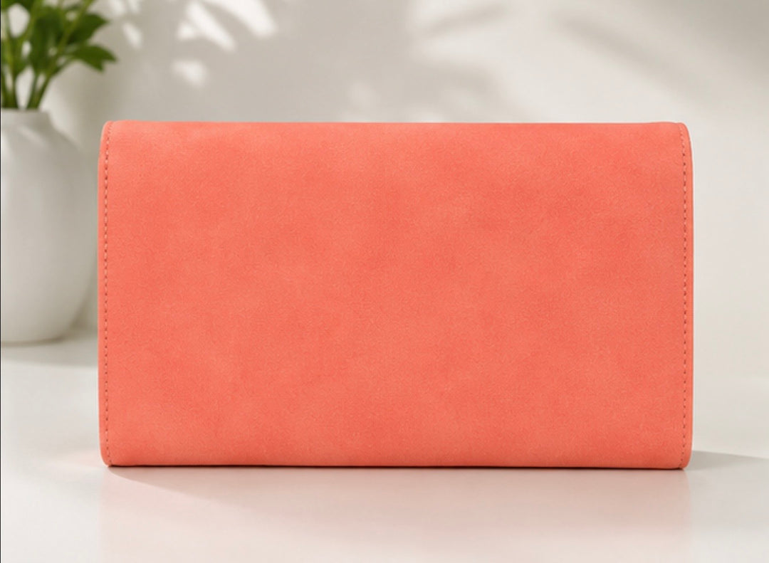 Salmon pink travel wallet purse with gold hardware 
