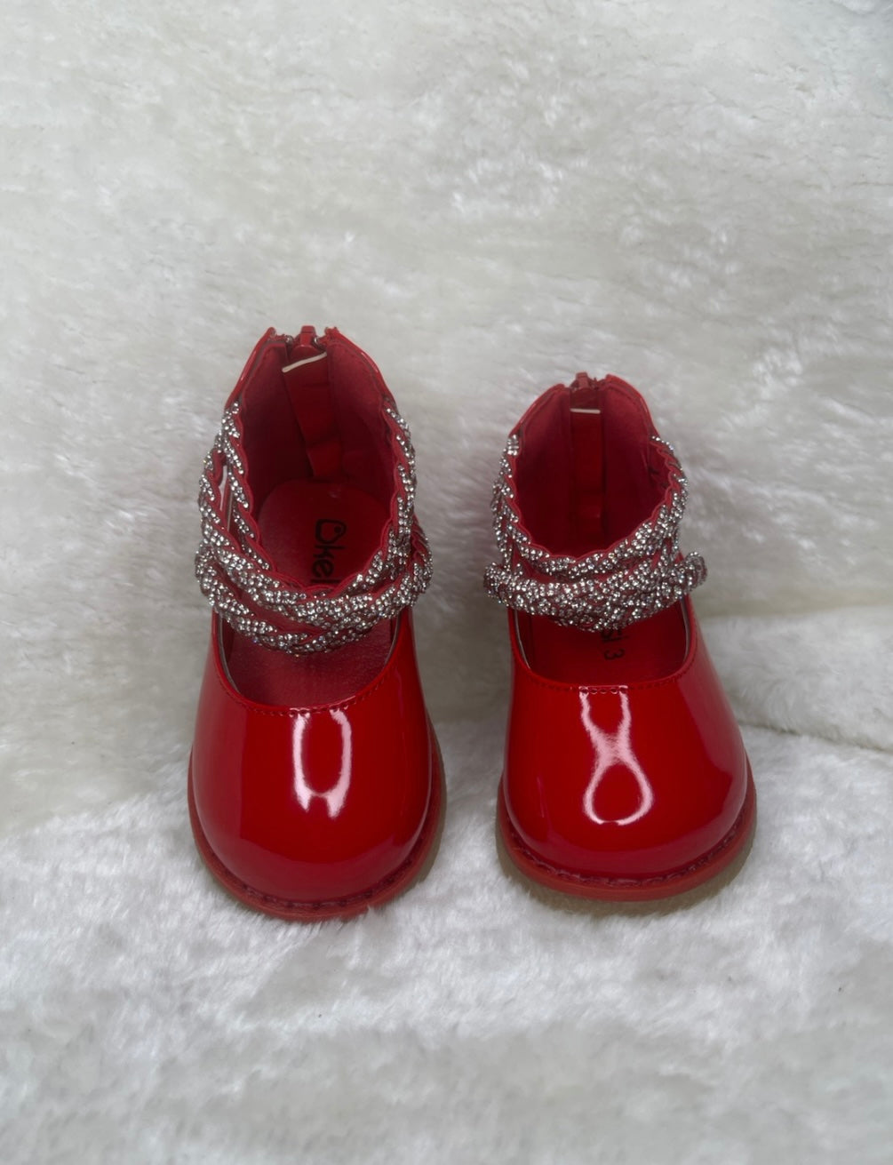 Red patent baby shoes