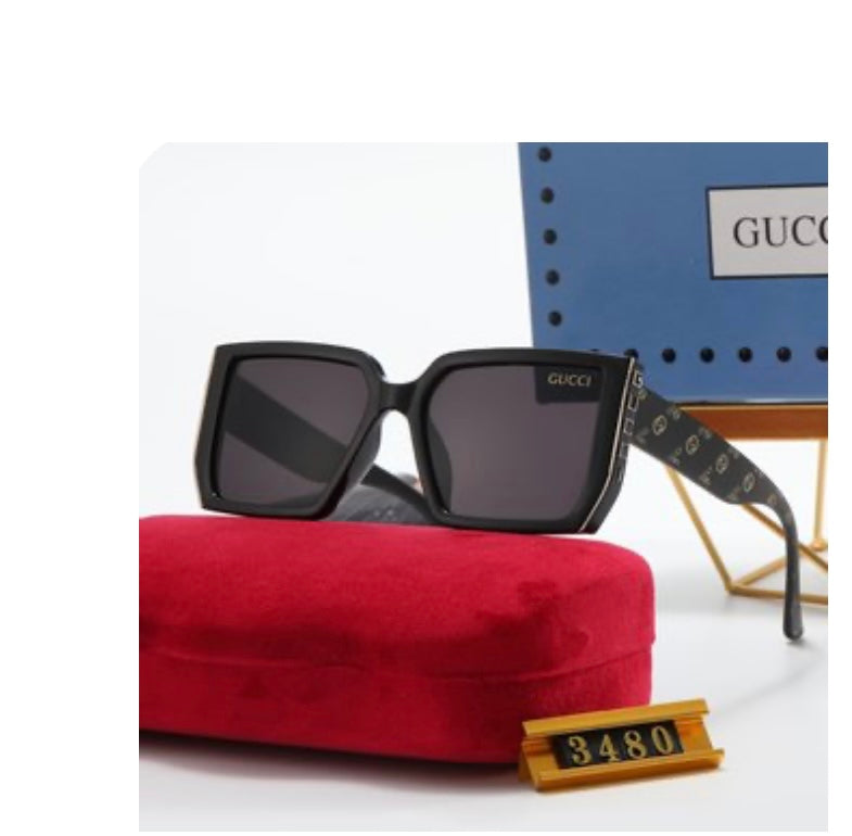Black sunglasses with gold letter text 