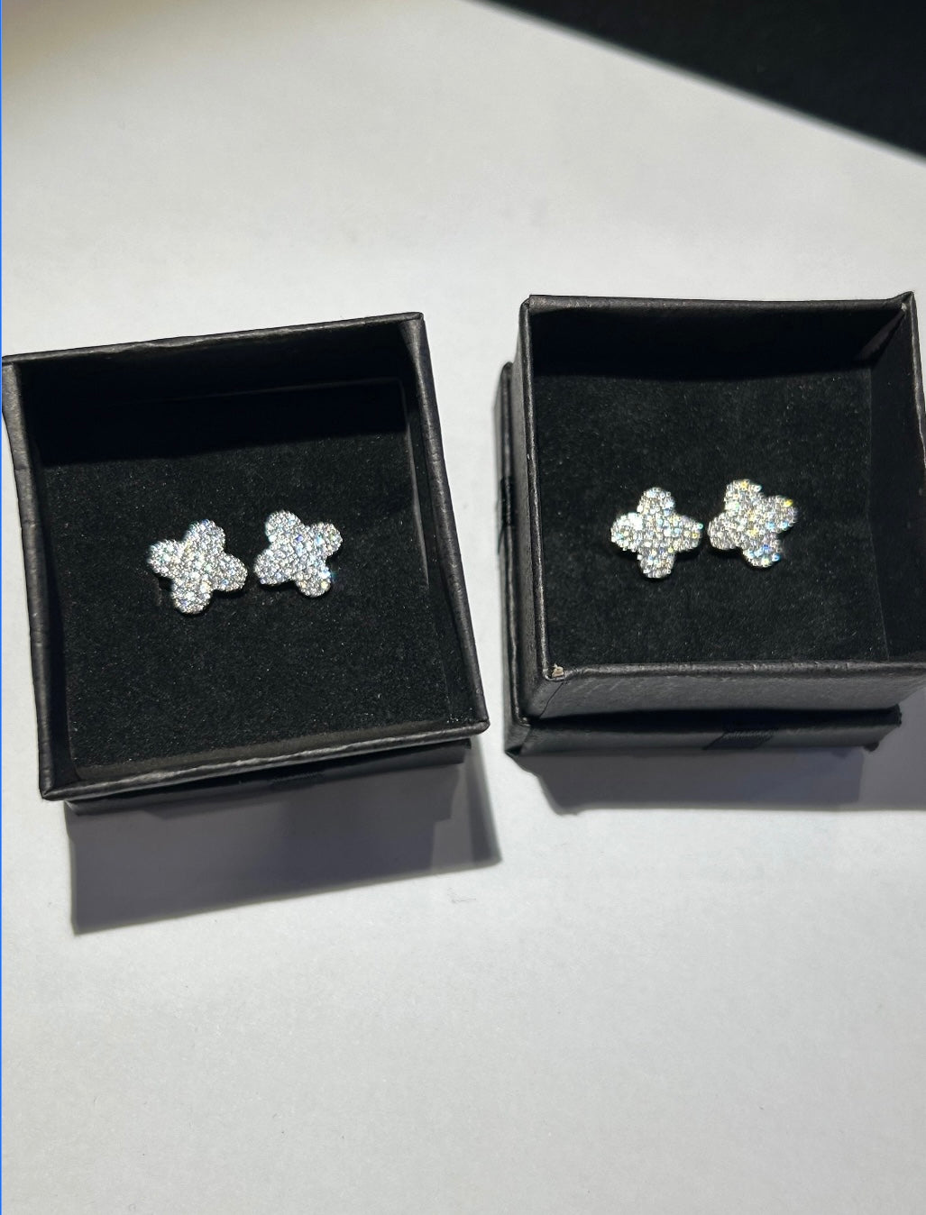 Silver crystal clip on clover earrings