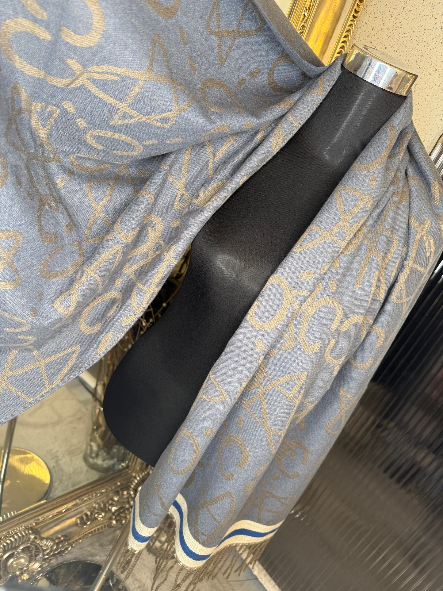 Blue scarf with stripe detail and tassel 