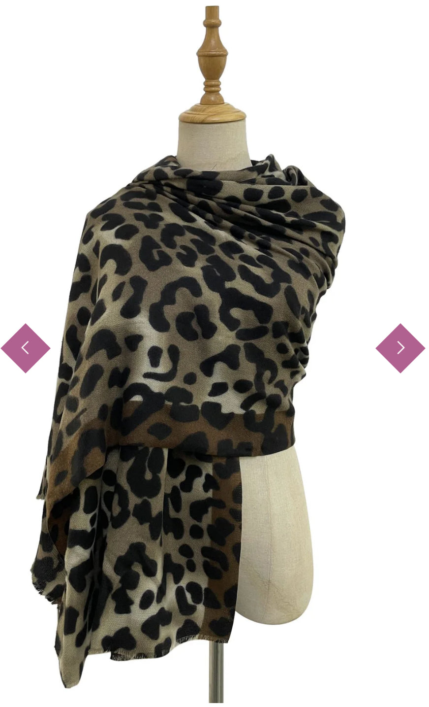 A leopard print scarf with frayed edges
