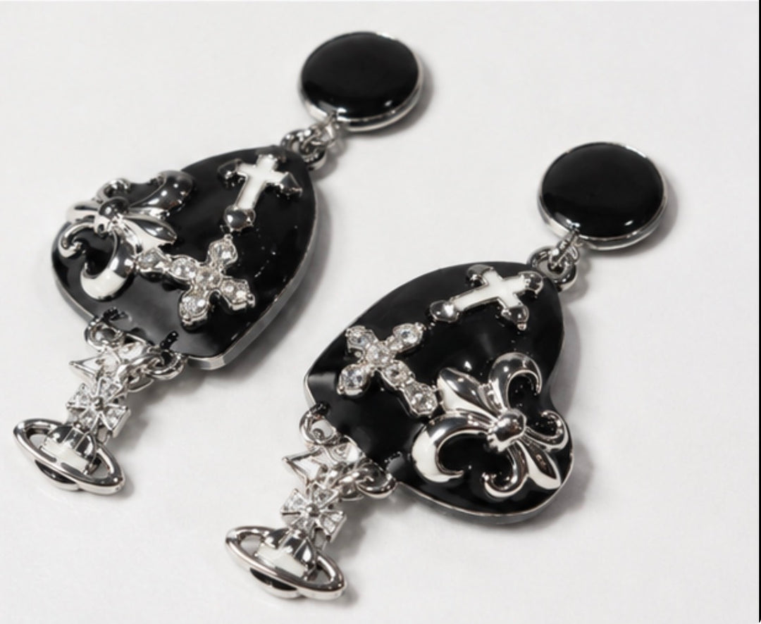 Black statement drop earrings with silver cross and charm detailing